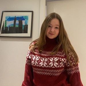 Im selling a dark red knit sweater. It’s from Abercrombie &Fitch.